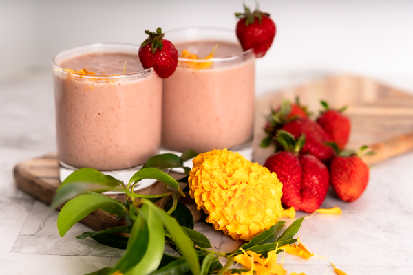 Strawberry Muffin Smoothie with strawberry garnishes