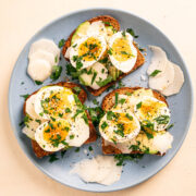 Soft Boiled Eggs on Toast with Sliced Turnips on a blue plate