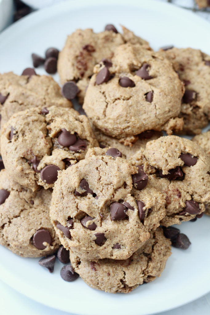 Almond butter chocolate chip cookies on a white plate