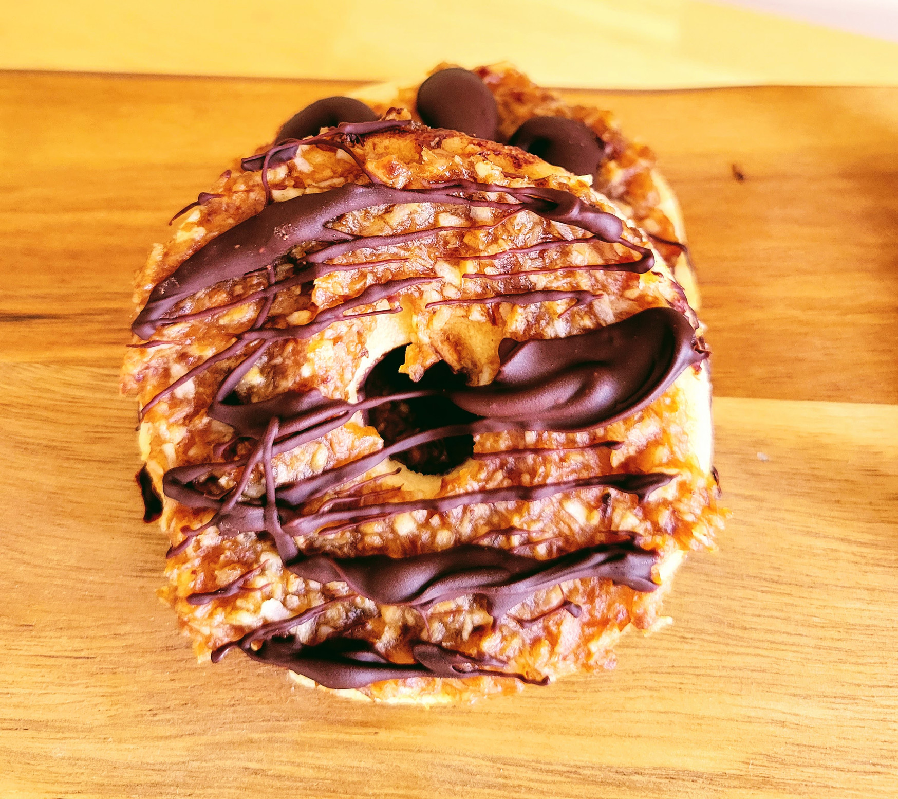healthy samoas girl scout cookie closeup on a wooden cutting board