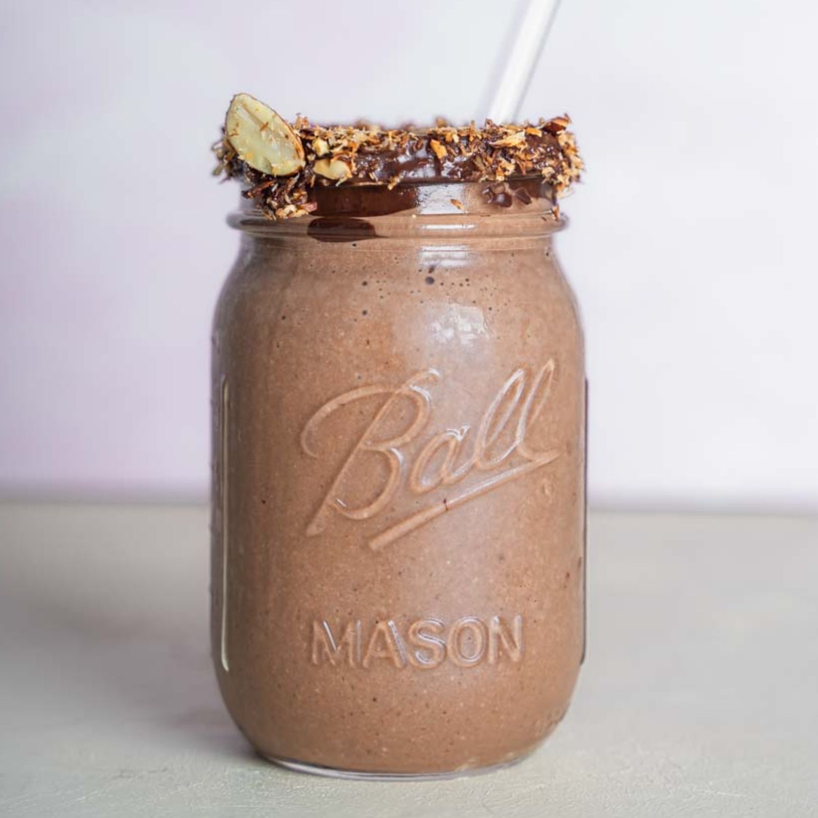 Deep Chocolate Brown Smoothie with a toasted nut rim