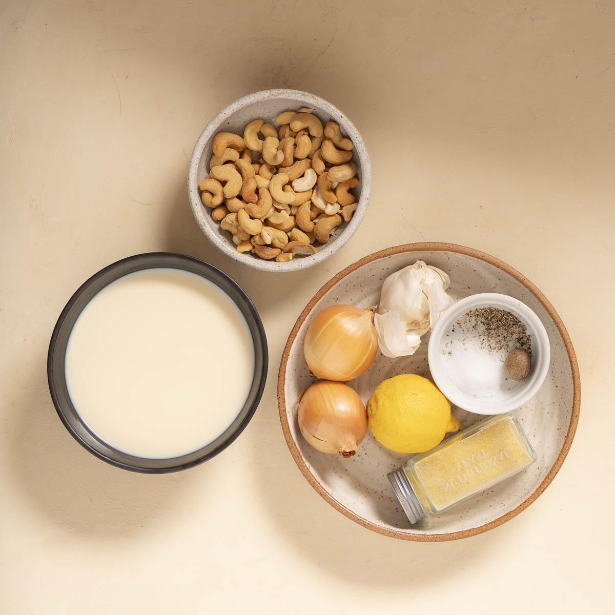 ingredients for vegan alfredo sauice with cashews